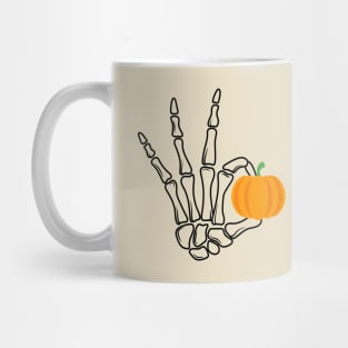 Skeleton hands holding Orange pumpkins - FUNNY Mug